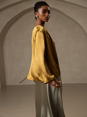 Women's gold 19 Momme mulberry silk relaxed long sleeve tie-front cardigan.