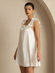 White 19Momme mulberry silk babydoll nightgown with ruffle straps and square neck.