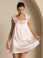 Women's pink mulberry silk babydoll nightgown with ruffle straps and square neck.