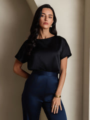 Women's black 19Momme mulberry silk short sleeve boat neck T-shirt with a luxurious sheen.