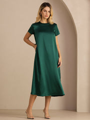 Women's 19Momme mulberry silk short sleeve crew neck midi dress in emerald green with side pockets.