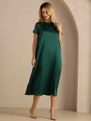 Women's 19Momme mulberry silk short sleeve crew neck midi dress in deep green with side pockets.