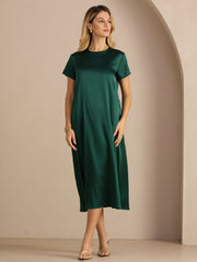 Women's 19Momme mulberry silk short sleeve crew neck midi dress in deep green with side pockets.