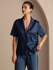 Women's navy blue mulberry silk short sleeve shirt with notched lapel and button-up design.