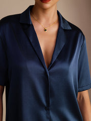 Women's navy blue mulberry silk short sleeve shirt with notched lapel and button-up design.