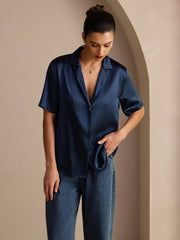 Women's navy blue mulberry silk short sleeve shirt with notched lapel and button-up design.