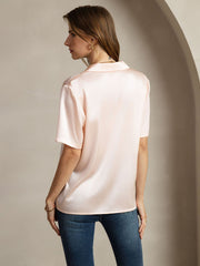 Women's pink 19 Momme mulberry silk short sleeve notched lapel shirt with button-up design.