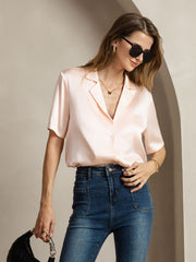 Pink 19Momme mulberry silk short sleeve notched lapel women's shirt with button-up design.
