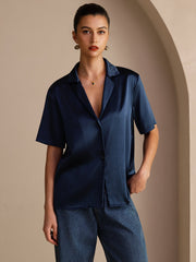 Dark blue 19Momme mulberry silk short sleeve notched lapel women's shirt with button-up design.