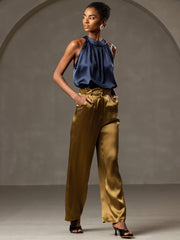 Women's navy mulberry silk sleeveless halter neck top with gold satin wide-leg pants.