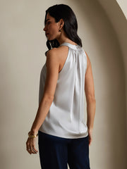 Women's light gray 19Momme mulberry silk sleeveless halter neck top with button detail.