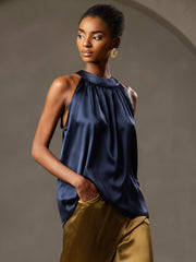 Dark blue 19 Momme mulberry silk sleeveless halter neck women's top with gathered neckline.