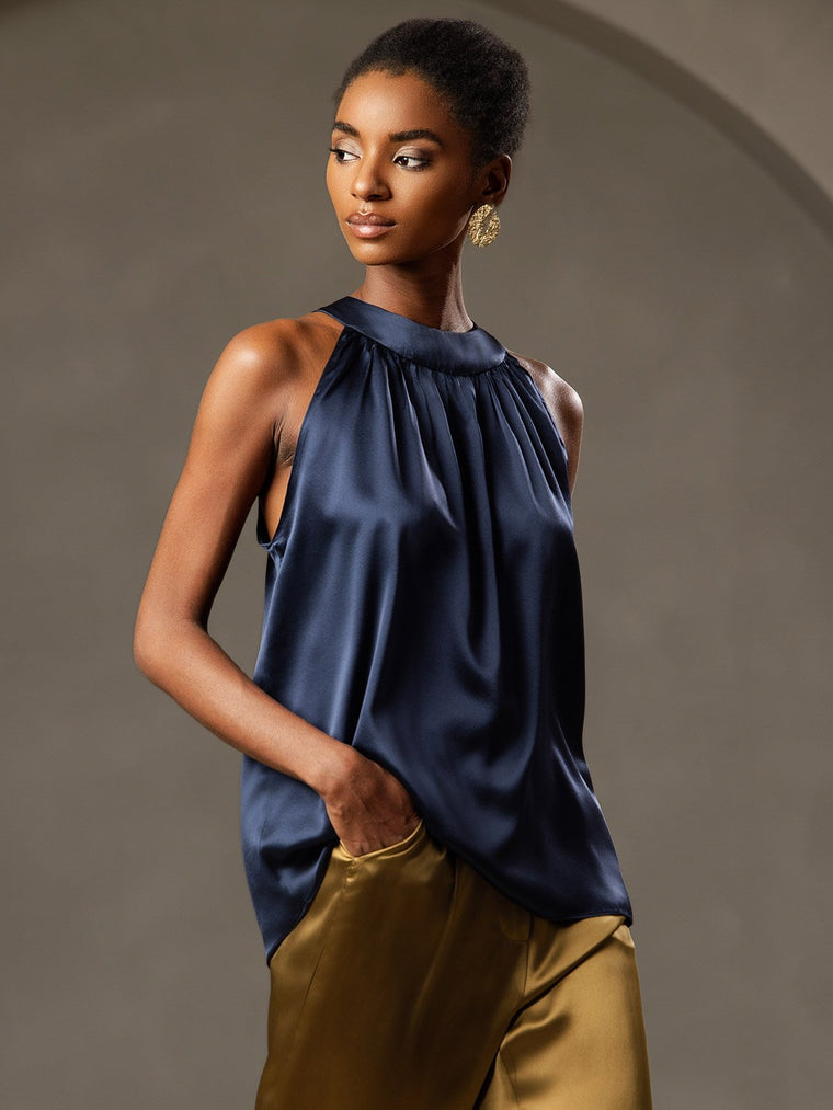 Dark blue 19 Momme mulberry silk sleeveless halter neck women's top with gathered neckline.