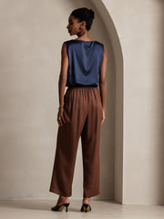 Women's navy 19Momme mulberry silk sleeveless round neck tank top with brown wide-leg pants.