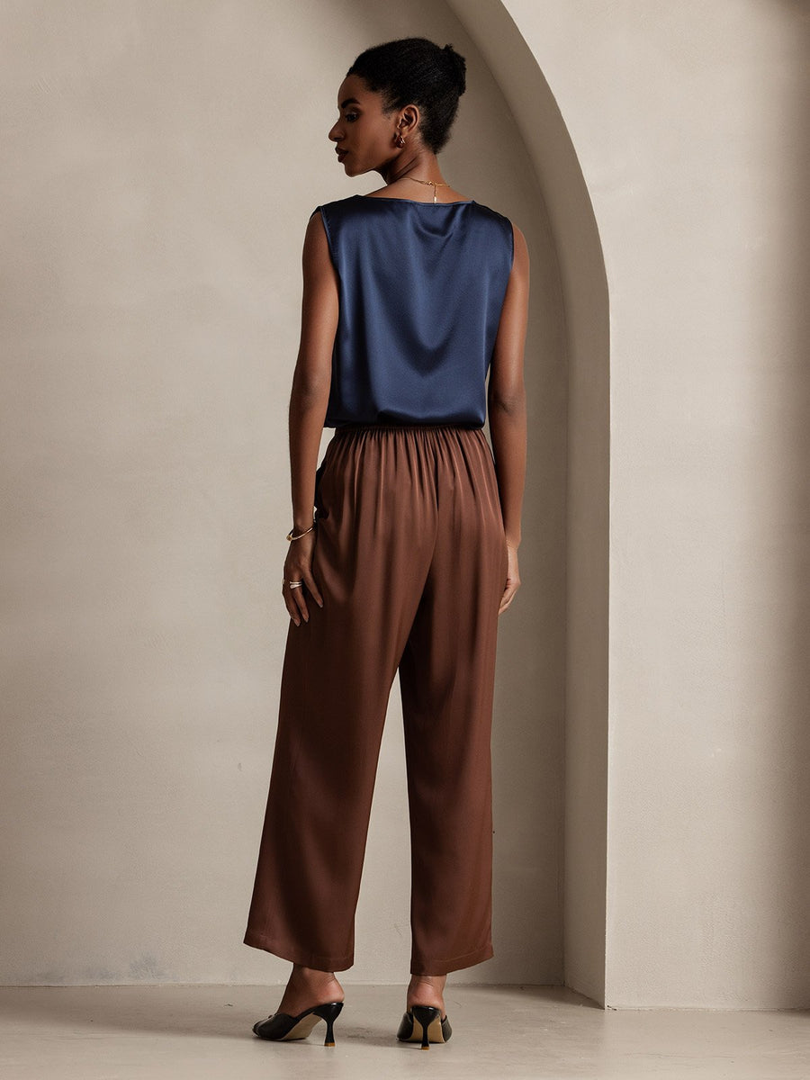 Women's navy 19Momme mulberry silk sleeveless round neck tank top with brown wide-leg pants.