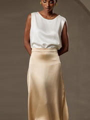 White 19Momme mulberry silk sleeveless round neck women's tank top with a champagne silk skirt.