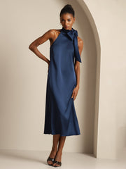 Navy 19Momme mulberry silk sleeveless tie-neck midi dress on a model.