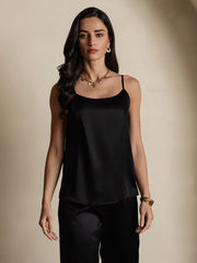 Black mulberry silk spaghetti strap camisole top on a woman.