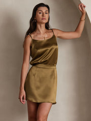 Women's olive green mulberry silk spaghetti strap camisole and matching mini skirt.