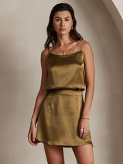 Brown mulberry silk spaghetti strap camisole and matching skirt on a model.