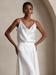 White 19Momme mulberry silk spaghetti strap cowl neck camisole top on a model.