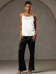 White 19Momme mulberry silk spaghetti strap camisole with a round neck, paired with black silk pants.